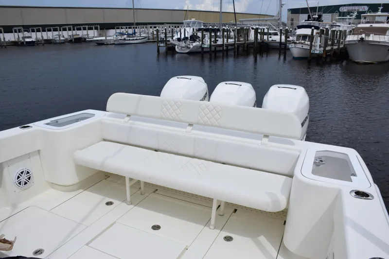  Yacht Photos Pics 2017 SeaVee 370z boat with triple engines, docked at a marina.