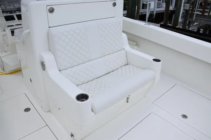 Yacht Photos Pics Luxurious white seating on 2017 SeaVee 370z boat with quilted design and cup holders.