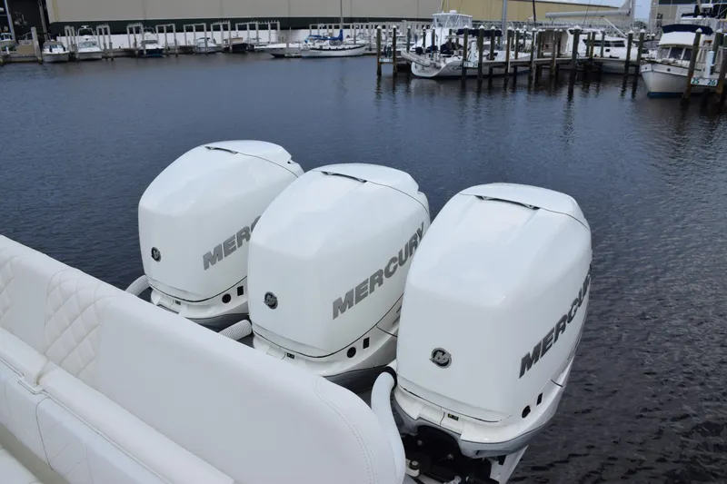  Yacht Photos Pics 2017 SeaVee 370z boat with triple Mercury outboard engines docked at marina.
