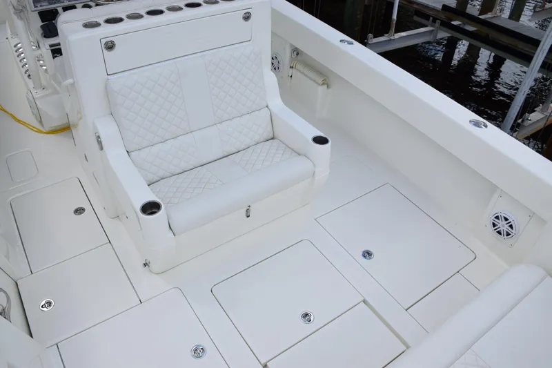  Yacht Photos Pics 2017 SeaVee 370z boat interior with white seating and storage compartments.