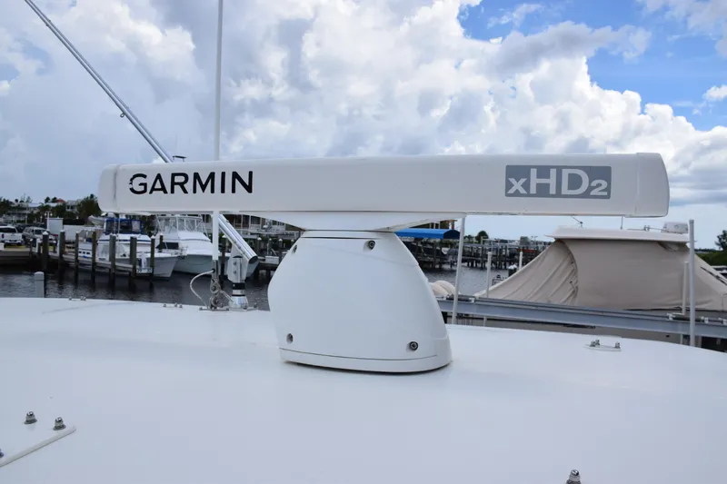  Yacht Photos Pics Garmin xHD2 radar on 2017 SeaVee 370z boat, docked under cloudy sky.