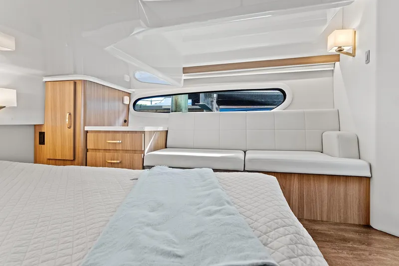 "seadancer" Yacht Photos Pics Luxurious interior of 2022 Regal 38 XO yacht with modern furnishings and elegant design.