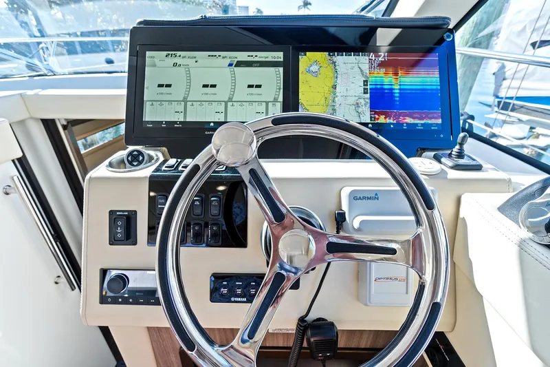 "seadancer" Yacht Photos Pics Helm of 2022 Regal 38 XO boat with advanced navigation displays.