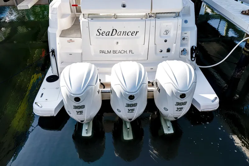 "seadancer" Yacht Photos Pics 2022 Regal 38 XO boat with triple 300 horsepower engines, docked in Palm Beach, FL.