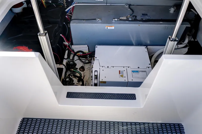 "seadancer" Yacht Photos Pics Engine compartment of 2022 Regal 38 XO boat, showcasing mechanical components and wiring.