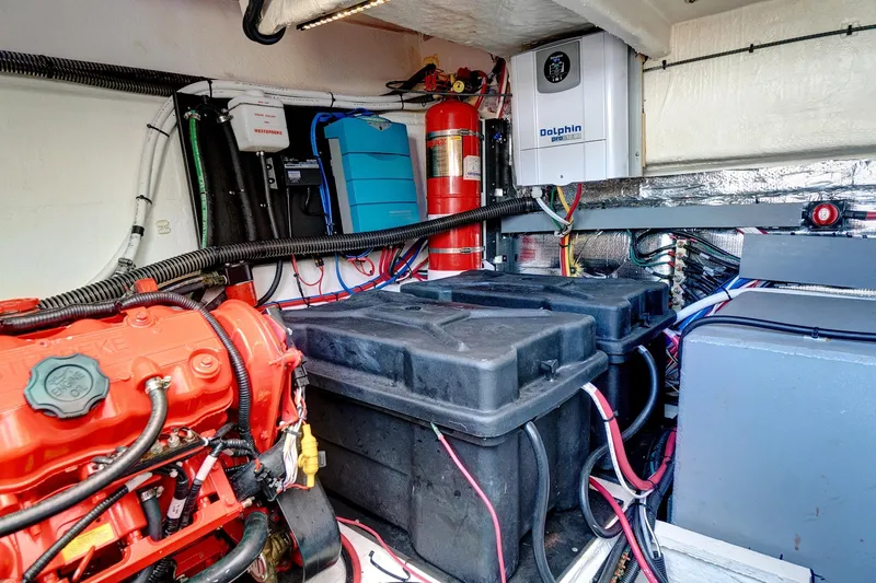 "seadancer" Yacht Photos Pics Engine room of 2022 Regal 38 XO yacht with visible components and wiring.