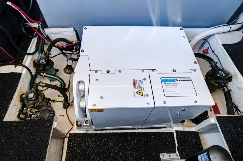 "seadancer" Yacht Photos Pics 2022 Regal 38 XO engine compartment with electrical components and wiring.
