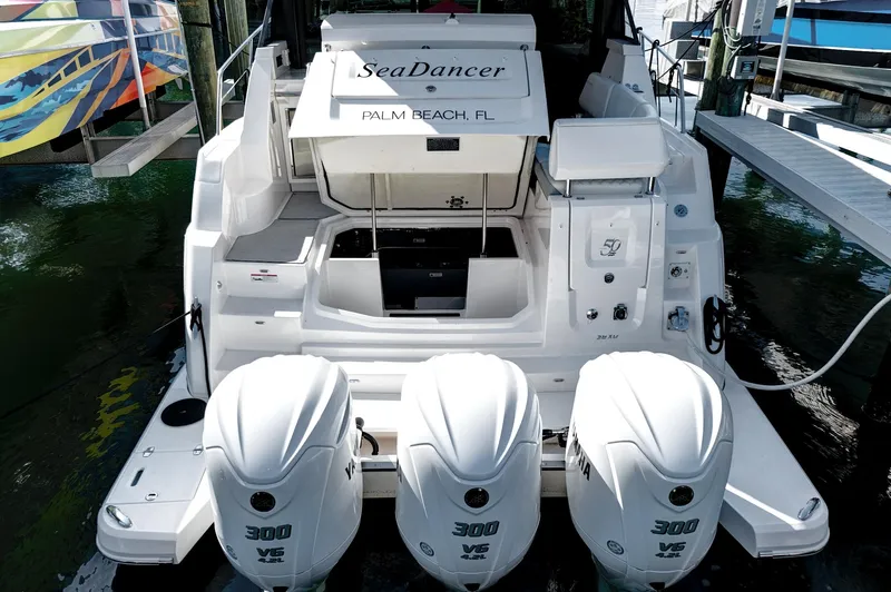 "seadancer" Yacht Photos Pics 2022 Regal 38 XO boat with triple Yamaha 300 engines, docked in Palm Beach, FL.