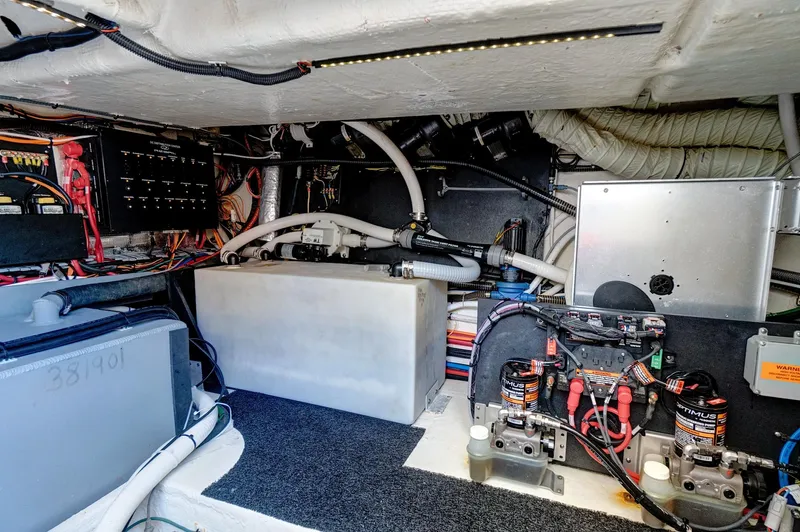 "seadancer" Yacht Photos Pics Engine room of 2022 Regal 38 XO boat, showcasing wiring and mechanical components.