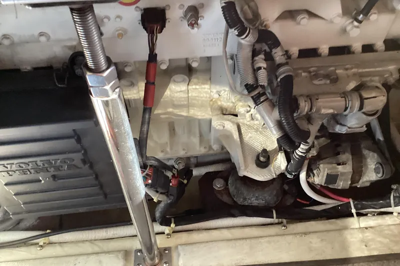 Fun Coupons Yacht Photos Pics Engine compartment of a 2005 Carver 41 Cockpit Motor Yacht with Volvo Penta components.