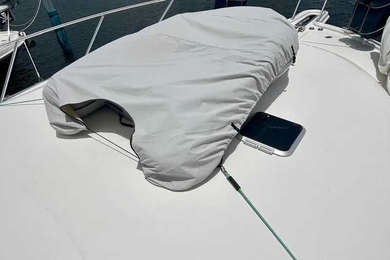 Redeye Yacht Photos Pics Covered hatch on 2012 Tiara Yachts 48 CNV deck, secured with ropes.