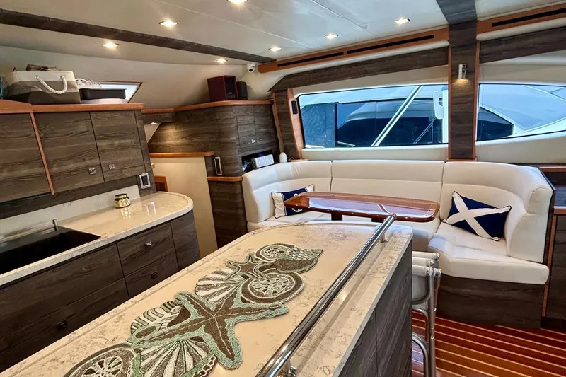 Redeye Yacht Photos Pics Luxurious interior of 2012 Tiara Yachts 48 CNV with elegant seating and modern design.