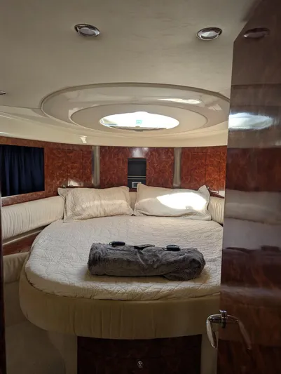  Yacht Photos Pics Luxurious cabin interior of 2007 Fairline Targa 52 GT yacht with round bed.