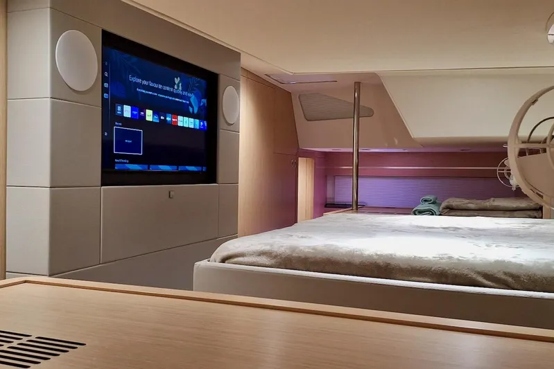 Emmanuel Yacht Photos Pics Luxurious interior of 2023 Privilege Signature 510 yacht with modern entertainment system.