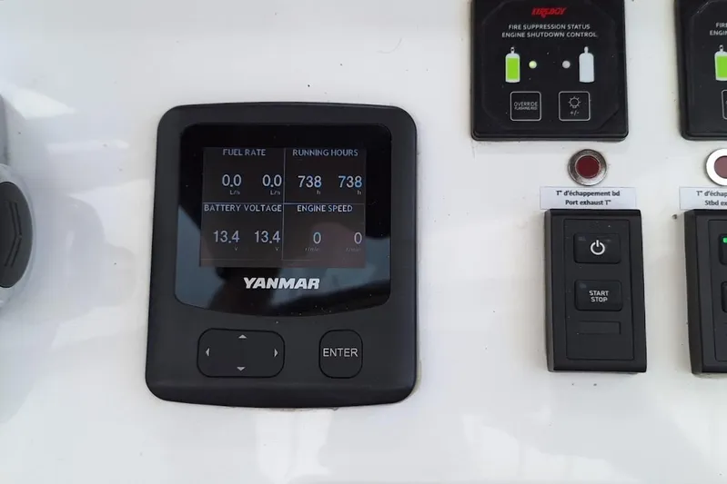 Emmanuel Yacht Photos Pics Control panel of 2023 Privilege Signature 510 yacht with Yanmar display and engine controls.