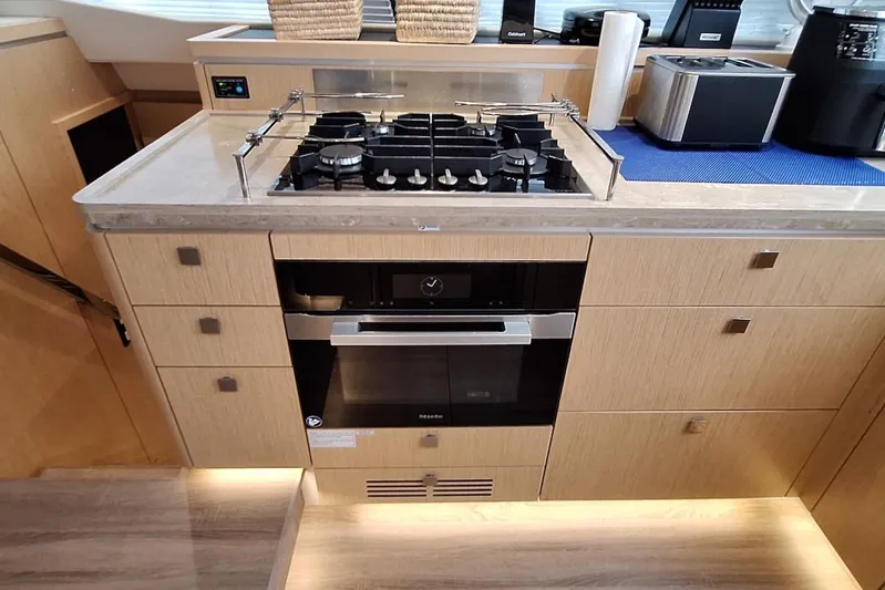 Emmanuel Yacht Photos Pics Modern kitchen in 2023 Privilege Signature 510 yacht with stove and oven.