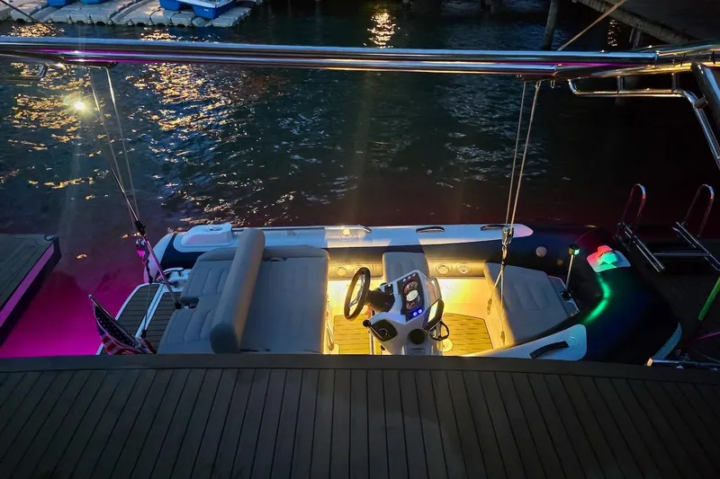 Emmanuel Yacht Photos Pics Luxurious 2023 Privilege Signature 510 yacht interior with ambient lighting at night.