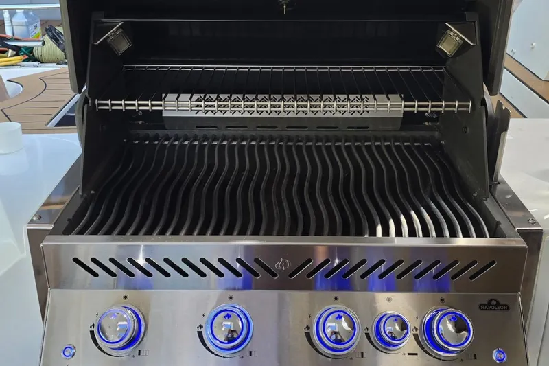Emmanuel Yacht Photos Pics 2023 Privilege Signature 510 grill with stainless steel design and illuminated control knobs.