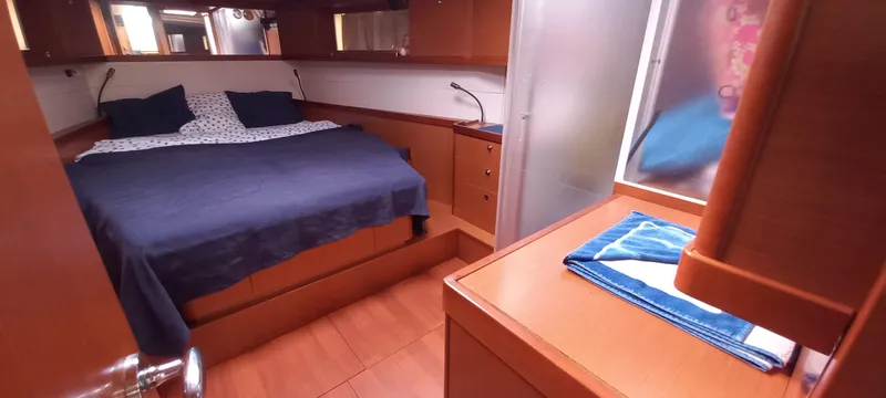 Lady Mys Yacht Photos Pics Luxurious cabin interior of 2013 Beneteau Oceanis 48 yacht with cozy bedding.