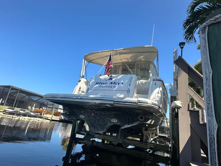  Yacht Photos Pics 2005 Tiara Yachts 3600 Sovran docked, rear view with American flag.