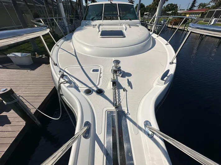  Yacht Photos Pics 2005 Tiara Yachts 3600 Sovran, white deck, docked at marina.