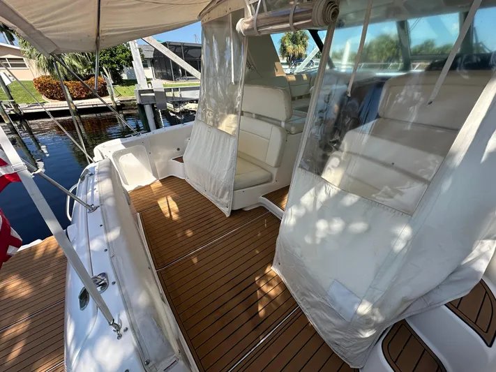  Yacht Photos Pics 2005 Tiara Yachts 3600 Sovran with teak deck and covered seating area.