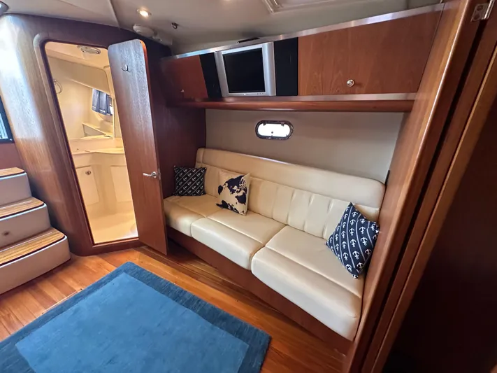  Yacht Photos Pics Interior of 2005 Tiara Yachts 3600 Sovran with leather seating and nautical decor.