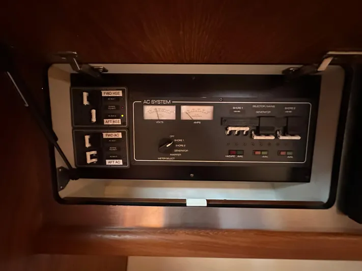  Yacht Photos Pics Control panel of 2005 Tiara Yachts 3600 Sovran, featuring AC system switches and indicators.