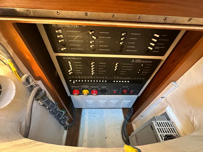  Yacht Photos Pics Electrical panel of 2005 Tiara Yachts 3600 Sovran, showcasing AC and DC distribution systems.