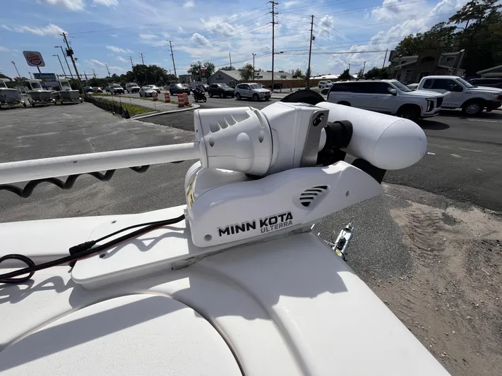  Yacht Photos Pics Minn Kota motor on 2023 Tidewater 2700 Carolina Bay boat, parked outdoors.