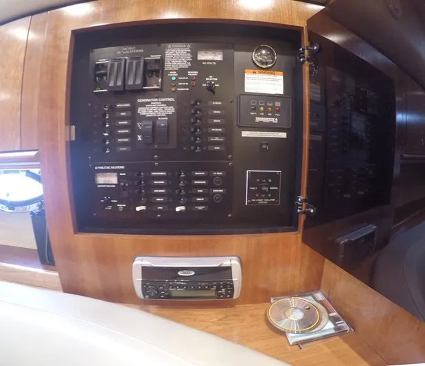 Grand Cru Yacht Photos Pics Electrical control panel inside 2005 Cruisers Yachts 340 Express, featuring switches and gauges.