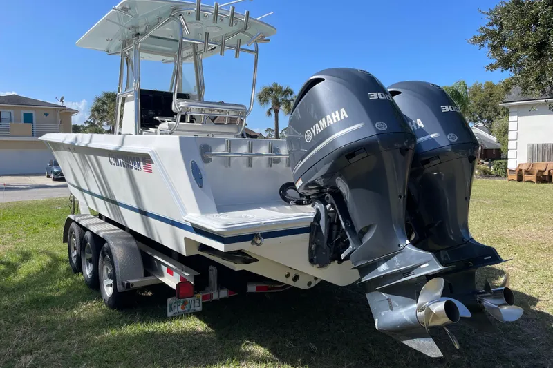 New Fuel Tanks Yacht Photos Pics 2008 Contender 27 Tournament boat with dual Yamaha engines on a trailer.