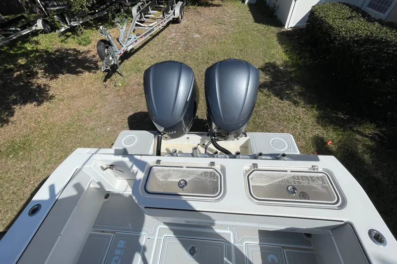 New Fuel Tanks Yacht Photos Pics 2008 Contender 27 Tournament boat with dual outboard motors, viewed from above.