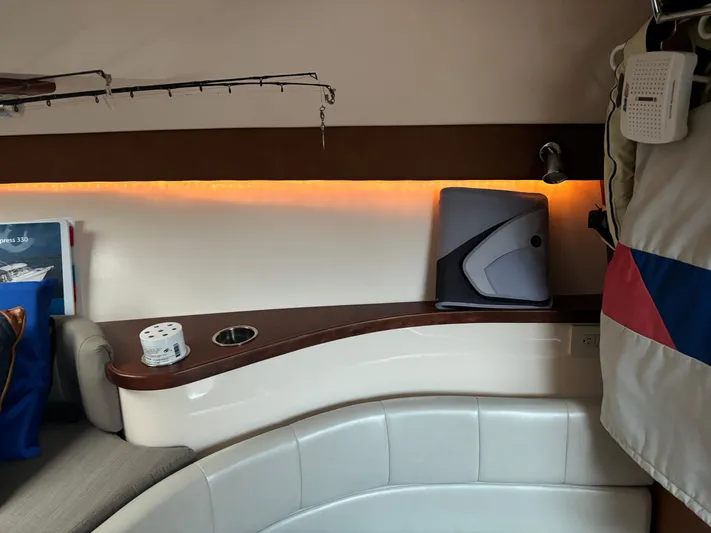  Yacht Photos Pics Interior of 2014 Grady-White Express 330 boat with seating and ambient lighting.