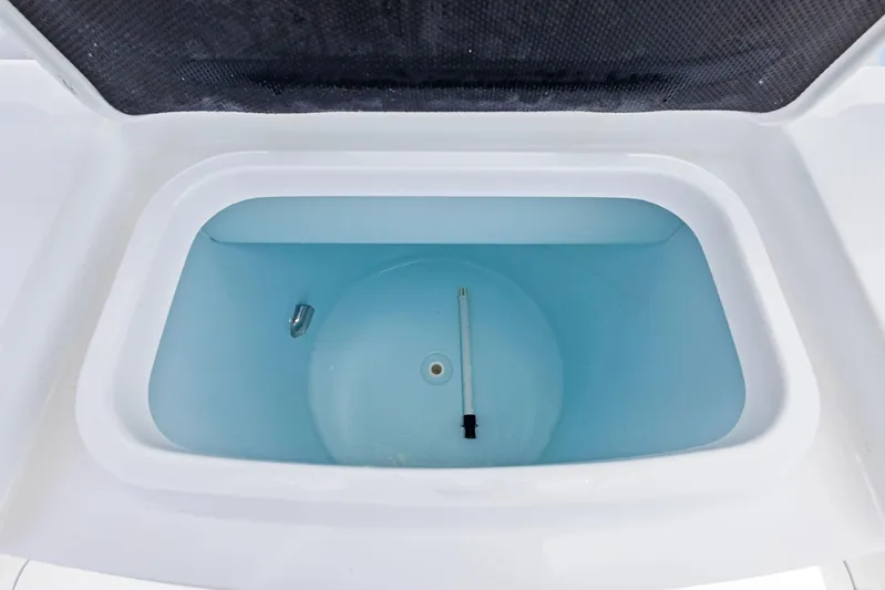  Yacht Photos Pics Livewell tank on 2016 Yellowfin 26 Hybrid boat, filled with water.