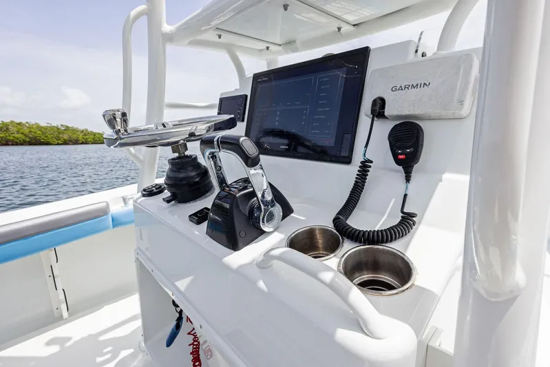 Yacht Photos Pics Control panel of 2016 Yellowfin 26 Hybrid boat with Garmin navigation system.