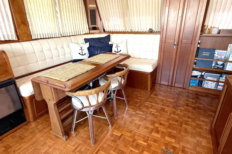 Summer Wind Yacht Photos Pics Interior of 1989 Grand Banks 46 Classic yacht with wood and leather seating.