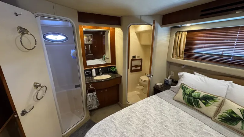  Yacht Photos Pics Luxurious 2005 Sea Ray 390 Motor Yacht interior with bedroom, bathroom, and shower.