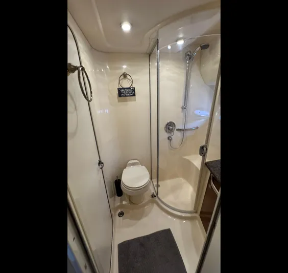  Yacht Photos Pics Bathroom interior of 2005 Sea Ray 390 Motor Yacht with shower and toilet.