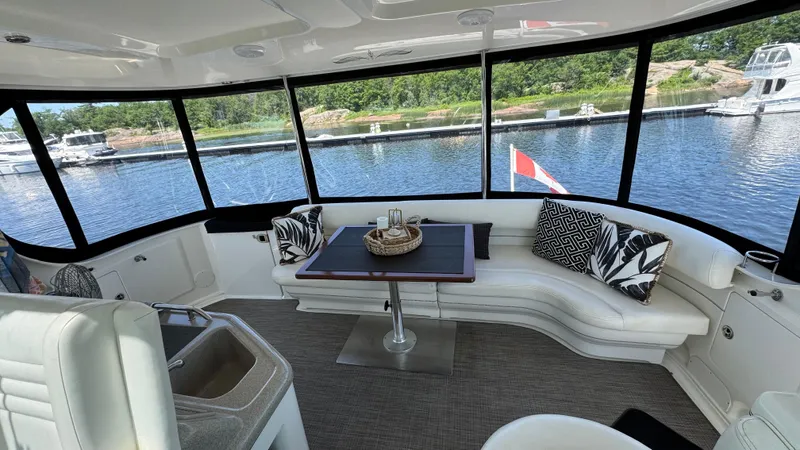  Yacht Photos Pics Luxurious interior of 2005 Sea Ray 390 Motor Yacht with scenic marina view.