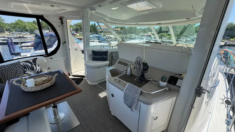  Yacht Photos Pics 2005 Sea Ray 390 Motor Yacht interior with elegant seating and modern amenities.