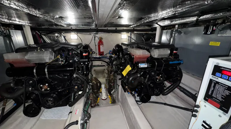  Yacht Photos Pics Engine room of 2005 Sea Ray 390 Motor Yacht with dual engines and control panel.