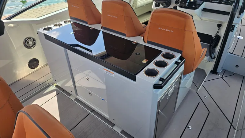  Yacht Photos Pics 2023 Saxdor 320 GTO interior with sleek seating and modern design elements.