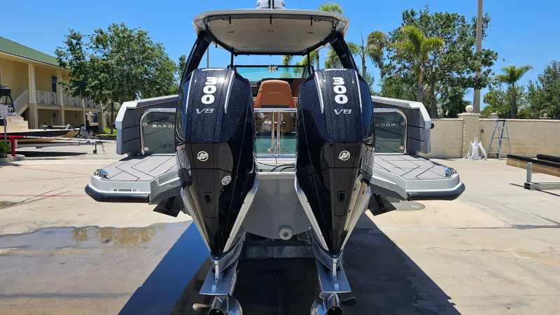  Yacht Photos Pics 2023 Saxdor 320 GTO with dual 300 V8 engines, docked outdoors.