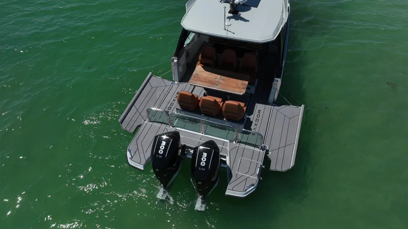  Yacht Photos Pics 2023 Saxdor 320 GTO boat with dual engines on green water.