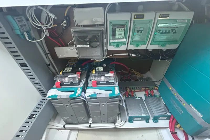  Yacht Photos Pics Electrical system of 2024 Beneteau Antares 9, featuring batteries and control panels.