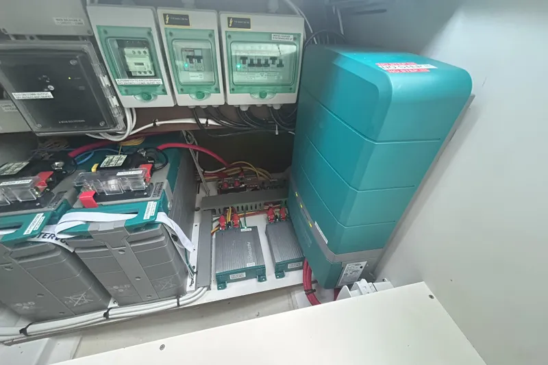  Yacht Photos Pics Electrical system of 2024 Beneteau Antares 9 boat, featuring batteries and circuit breakers.