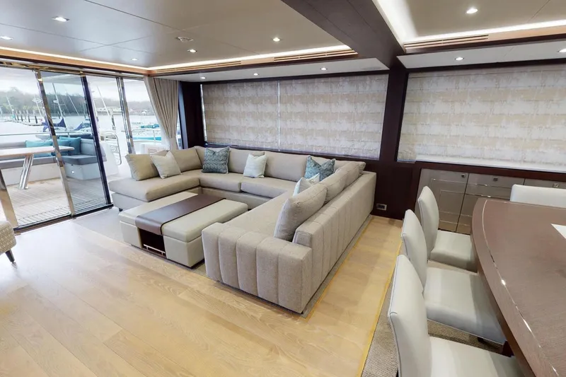  Yacht Photos Pics Luxurious interior of 2018 Sunseeker 95 Yacht with elegant seating and modern decor.