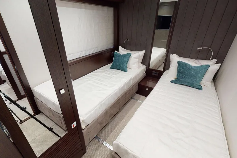  Yacht Photos Pics Luxurious twin bedroom on 2018 Sunseeker 95 Yacht with modern decor and teal accents.