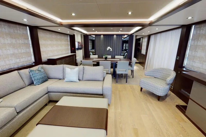  Yacht Photos Pics Luxurious interior of 2018 Sunseeker 95 Yacht with elegant seating and dining area.